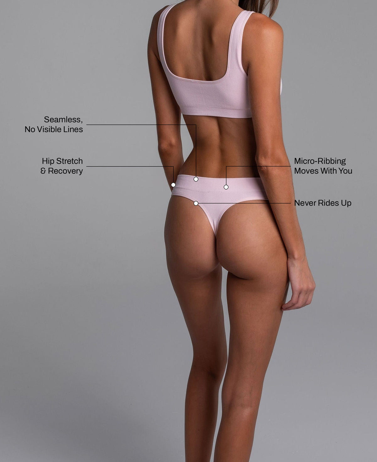 Low Hide Ribbed Thong in Studio Pink: seamless no visible lines, hip stretch and recovery, micro-ribbing that moves with you, never rides up